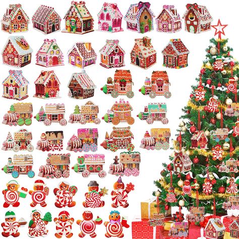 PRICES MAY VARY. Enough Candy Gingerbread Christmas Tree Hanging Ornaments: you will receive 36 pieces of candy gingerbread man house train ornaments in 3 elements, each element has 6 styles, and each style has 2 colors, each candy gingerbread man house train ornament is equipped with 1 hanging rope, sufficient in quantity and rich in style to meet your daily decorative needs, and you can share with your friends Hard to Break and Fade: these Christmas candy gingerbread man ornaments are made of Gingerbread Themed Christmas Trees, Gingerbread Hot Air Balloon, Ginger Bread Man Christmas Tree, Gingerbread Trees Christmas, Ginger Bread Christmas Trees, Gingerbread Christmas Decorations Tree, Gingerbread Christmas Tree Ideas, Gingerbread Tree Decorations, Diy Gingerbread House Decorations