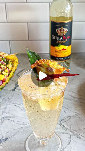 Sarah McCune on Instagram: "#Stellabrating Hispanic Heritage Month with a glass of @stellarosa Pineapple & Chili Wine paired with my Summer Pineapple Salsa. 

Try it with this recipe! !Salud!

 #ad #stellabrate #hispanicheritagemonth 

Stella Rosa Pineapple & Chili Wine served with honey, chili powder, + lime juice. Garnished with dehydrated pineapple + chile de àrbol.

Pineapple Salsa Recipe:
1/2 Pineapple, diced, hollowed
1/4 Red onion
2 Garlic cloves 
1 Roma tomato 
1-2 Jalapeños
Pinch of salt 
2 Chiles de àrbol (optional)
Dice all ingredients and combine." Dehydrated Pineapple, Pineapple Chili, Pineapple Salsa Recipe, Roma Tomato, Stella Rosa, Summer Pineapple, Salsa Sauce, Pineapple Salsa, Serving Wine