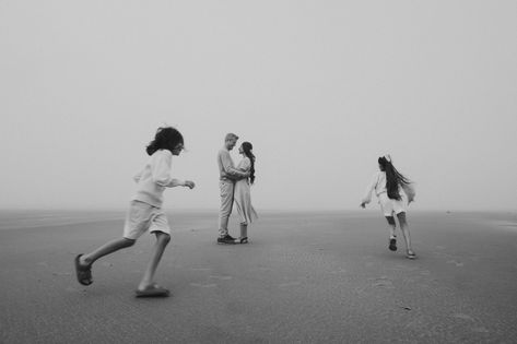 Black and white photo of family of four walking on Combers Beach Tofino with motion blur Beach Family Photos, Summer Morning, Family Of Four, Motion Blur, White Photo, Long Beach, Family Photographer, Blur, Family Photos