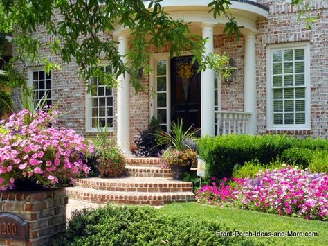 Round front porch and brick walkway landscaped to perfection. Front-Porch-Ideas-and-More.com #beautiful Round Front Steps, Rounded Porch Steps, Rounded Brick Steps, Rounded Front Porch, Brick Portico, Round Front Porch, Step Decor, Round Balcony, Brick Stairs