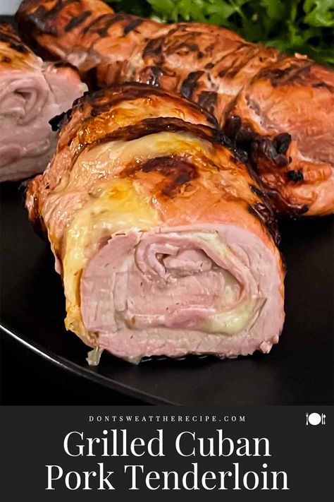 Try this delicious Grilled Cuban Pork Tenderloin Roulade with ham and Swiss cheese, marinated in citrus and spices, perfect for any meal or a tasty Cuban sandwich! Pork Tenderloin Roulade, Cuban Pork Tenderloin, Pork Roulade, Cuban Pork, Ham And Swiss, Grilled Pork Tenderloin, Cuban Sandwich, Deli Ham, Grilled Seafood