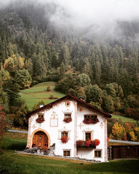 val mustair, switzerland - travel | switzerland - swiss alps - mountains - forest - village - house - architecture - clouds - cloudy - mountain - europe - eurotrip - roam - roaming - trip - holiday - wanderlust - adventure - explore - bucket list - vacation - discover places - get lost - long term travel - idea - ideas - inspiration - landscape photography Fashion Fairytale, Core Fashion, Fairytale Cottage, Fotografi Kota, House Cottage, Casa Exterior, Cute House, Pretty House, Pretty Places