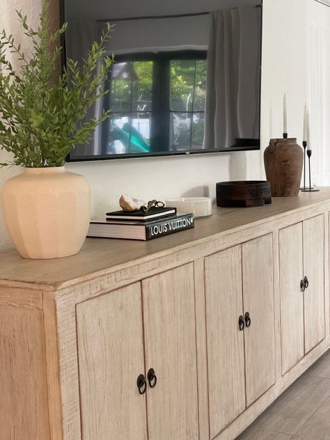 Tv Console Inspiration, Modern Living Room Tv Console, Decorating Above Tv Stand, Living Room No Tv Stand, Modern Entertainment Center Decor, Apartment Tv Console, Low Tv Console Decorating, Sideboard For Tv, Sideboard Styling Under Tv