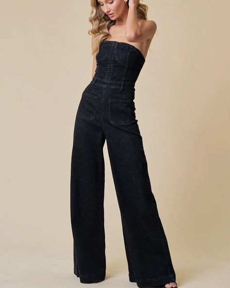 🆕🆕🆕🆕🆕 {ZORA WIDE LEG DENIM JUMPSUIT} Crafted in sleek black denim, this jumpsuit exudes timeless sophistication. Its strapless design and bustier top effortlessly blend elegance with a hint of edge, while the wide-leg silhouette ensures unrestricted movement. Plus, with its stretch fabric, it promises both style and comfort for any occasion. Elevate your wardrobe with this versatile statement piece that transitions seamlessly from day to night. Krista did a try on of this one and her... Black High Rise Fitted Denim Jumpsuit, Chic Wide-leg Denim Jumpsuit, Zara Denim Corset Jumpsuit, Zara Black Denim Corset Jumpsuit, Black High-waisted Denim Jumpsuit With Pockets, Bustier Top, Day To Night, To Night, Denim Jumpsuit