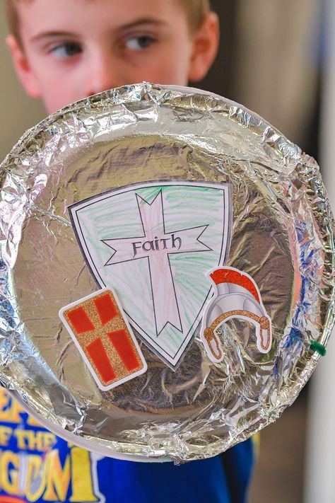 Armor Of God Shield Of Faith Craft, The Shield Of Faith Craft, Kingdom Rock Vbs Crafts, Vbs Decorating Ideas Armor Of God, Diy Shield Of Faith, Keepers Of The Kingdom Vbs Craft Ideas, Shield Craft Preschool, The Armor Of God Craft, Vbs Armor Of God Crafts