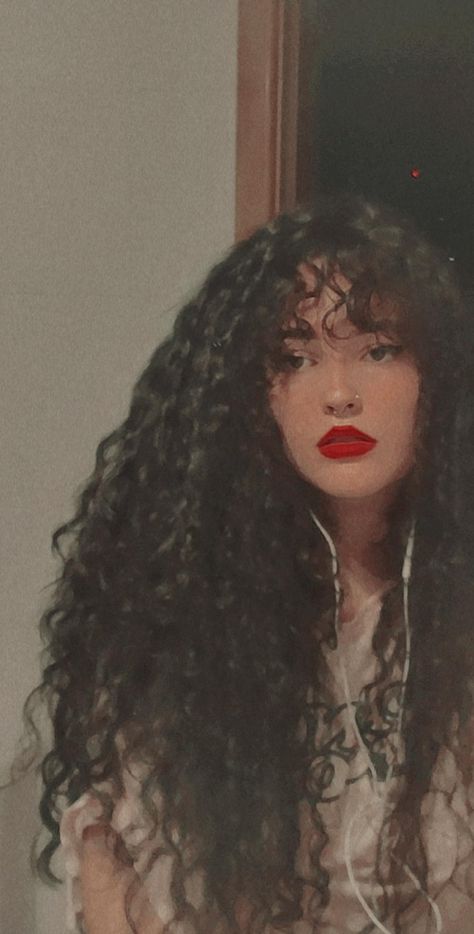 Curly Bangs Wispy, Curly Straight Across Bangs, Long Curly Hair And Bangs, Butterfly Bangs Curly Hair, Long Hair With Bangs Curly, Curly Bangs Aesthetic, Gothic Curly Hair, Long Curly Hair With Fringe, Styling Curly Bangs