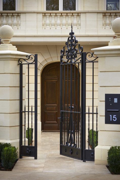 Wrought iron gate and feature limestone facade of luxurious French Provincial style home showcased in Melbourne Custom Homes magazine, see more at www.customhomesmag.com Luxury Fences And Gates, French Gates Entrance, French Iron Doors, French Provincial Front Fence, Boundary Walls Classic, European Gate Entrance, Palace Gates Entrance, Limestone Facade, French Gates