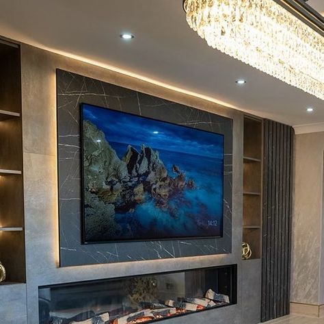 Inspirational Fires & Media Walls on Instagram: "A Media wall taken to another level.  This client wanted us to create a real feature in their living room with a 85” tv, hidden doors, storage space, shelves, hidden led lights and a huge 2.4m fire. #mediawall #fireplace #tv #lounge #roomideas #livingroom #home #designer #interiordesigner" Tv Hidden, Media Walls, Tv Lounge, Hidden Doors, Dark Blue Wallpaper, Tv Media, Hidden Door, Projector Screen, Media Wall