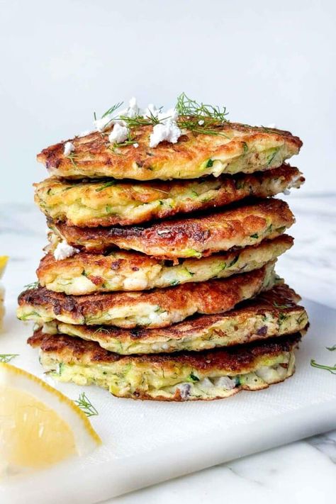 Zucchini Fritters (with Feta and Dill) | foodiecrush.com Foodiecrush Recipes, Greek Chicken Marinade, Zucchini Fritters Recipe, Autumn Recipes Vegetarian, Chicken Gyros, Foodie Crush, Zucchini Fritters, Shredded Zucchini, Grilled Asparagus