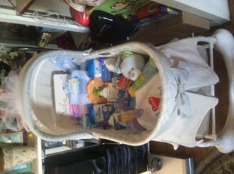 Baby shower gift idea for My sister in laws first baby. I filled a bassinets to keep at grandma's house with things most people don't remember you need. Travel size powder, wipes, boogie wipes, temperature patches, rice cereal, bath puppet, baby record book, mini hand towels etc etc. She loved! Bassinet Gift Basket, Boogie Wipes, Baby Record Book, Baby Shower Gift Idea, Rice Cereal, Grandma's House, Baby Bassinet, Baby Gift Basket, Mini Hands