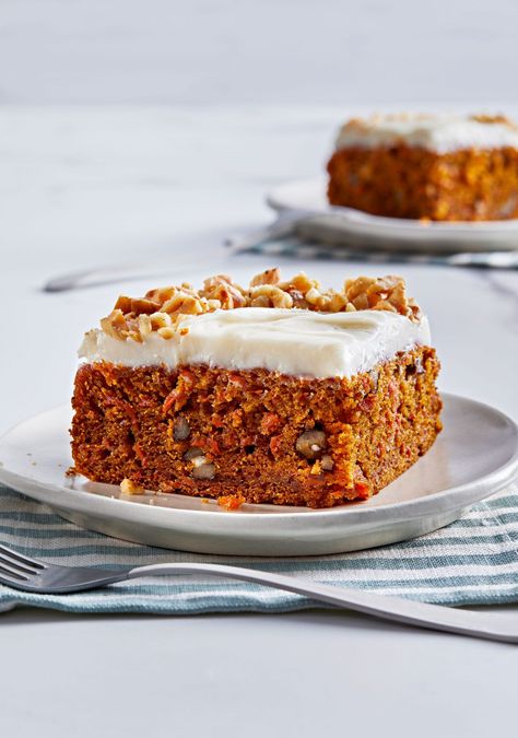 We consider ourselves an authority on Carrot Cake (our Best Carrot Cake even got Chrissy Teigan's stamp of approval), so when we tell you that you're going to love this Carrot-Walnut Snack Cake with Cream Cheese Frosting, trust us and get baking. #dessert #recipe #cakerecipe #carrotcake #southernliving Classic Carrot Cake Recipe, Tarte Vegan, Cream Cheese Frosting Cake, Best Carrot Cake, Carrot Cake Recipe, Crumb Topping, Spice Cake, Cake With Cream Cheese, Round Cake Pans