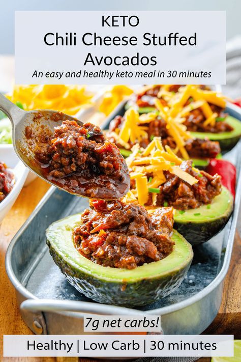 Chili cheese stuffed avocado is healthy low carb meal that is quick and easy to make. Fresh, ripe avocados, stuffed with a homemade stovetop beef chili and topped with cheddar cheese and all your favourite chili fixin's. Chili With Avocado, Baked Avocado Recipes, Avocado Baking Recipes, Low Carb Beans, Stovetop Chili, Stuffed Avocados, Stuffed Avocado, Carnivore Recipes, Low Carb Chili