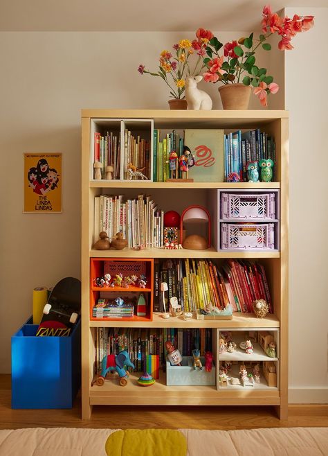 Bookshelf In Playroom, Colorful Montessori Nursery, Bookshelf Storage Organization, Children’s Storage, Bedroom With Different Color Furniture, Book Cases In Bedroom, Kids Bedroom Bookshelf Ideas, Book Storage Kids Room, Colorful Closet Interior