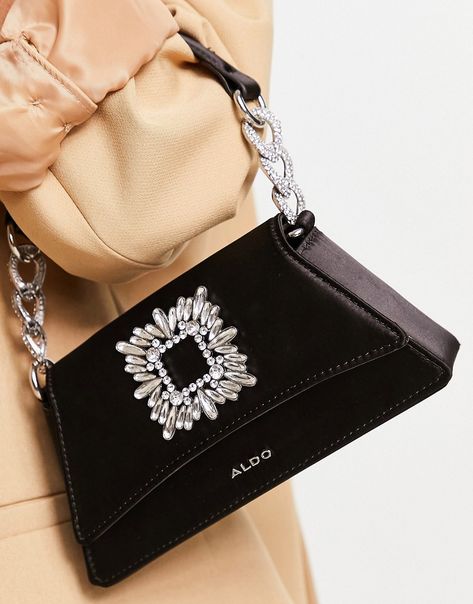 Accessories by ALDO Bag yourself the ultimate accessory Embellished brooch detail Top handle Fold-over flap top Pin-buckle fastening Aldo Bags Handbags, Aldo Bags, Verses Quotes, Luxury Purses, Grab Bag, Top Pins, Crystal Embellishment, Grab Bags, Black Mini