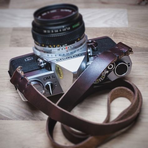 Our HL Wide neck straps with split ring attachment are available now in the shop --> 595strapco.com #believeinfilm Brown Camera, Camera Neck Strap, Camera Wrist Strap, Camera Storage, Horween Chromexcel, Simple Classic Style, Leather Camera Strap, Ring Der O, Camera Straps