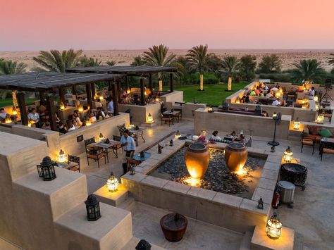 Bab Al Shams Desert Resort and Spa Dubai, United Arab Emirates Rising out of the dunes just 40 minutes outside Dubai, the Bab Al Shams Desert Resort and Spa is an oasis of luxury. The hotel is built to resemble an Arab fort and is home to several open-air restaurants that serve Arabian and Indian cuisine under the desert stars. (© Iain Masterton / Alamy) Bab Al Shams, Best Hotels In Dubai, Resort Interior Design, Rooftop Restaurant Design, Open Air Restaurant, Cafe Photos, Timur Tengah, Terrasse Design, Desert Resort