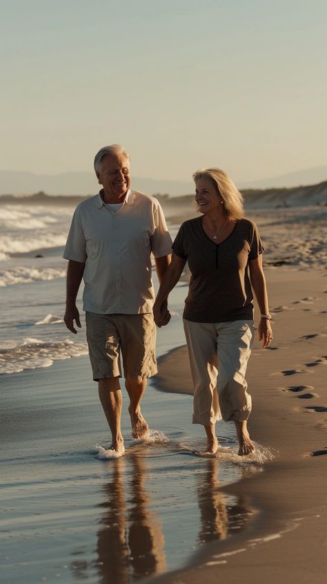 Beachside Couple Stroll: A mature couple enjoys a serene walk along the shore, with gentle waves washing over their feet. #beach #couple #sunset #walk #ocean #mature #serene #shore #aiart #aiphoto #stockcake https://ayr.app/l/XZoe Beach Walk Couple, Couple Walking On Beach, Couple Sunset, Sunset Walk, Travel Mood, Couple Beach Photos, Couples Travel, Beach Couple, Couples Walking