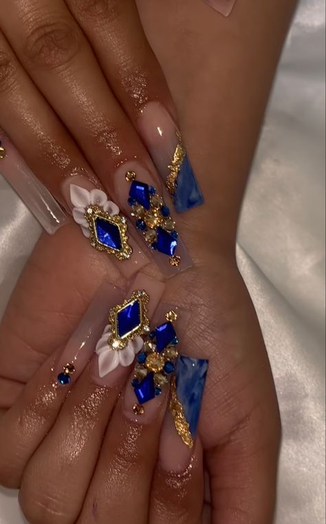 Royal Blue Quinceanera Nails Gold, Royal Blue Acrylic Nails With Gold, Navy Blue Bling Nails, Dark Blue Quince Dress With Gold, Blue N Gold Nails, Quinceanera Makeup Royal Blue And Gold, Navy Blue And Gold Prom Dress, Quinceanera Nails Blue And Gold, Dark Blue And Gold Nails Acrylic