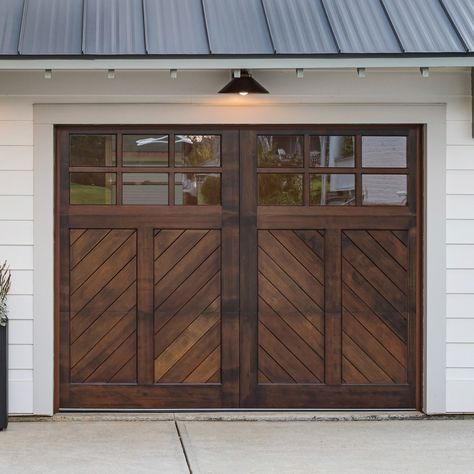 We're spellbound by these super natural wood doors! More than mere entryways, they are true pieces of art, adding a captivating accent or serving as a "third neutral" in outdoor settings. Spooky, stylish, and perfect for the season! 👻 Send us a DM to discover the magic! 📷: Andy Frame | @carusobuilders #ClopayGarageDoors #exteriordesign #curbappeal #wooddoors #rustic #neutral #supernatural Rustic Garage Door, Wood Look Garage Doors, Oak Garage Doors, Natural Wood Doors, Brown Garage Door, Barndo Ideas, Faux Wood Garage Door, Wood Garage, Wood Garage Doors