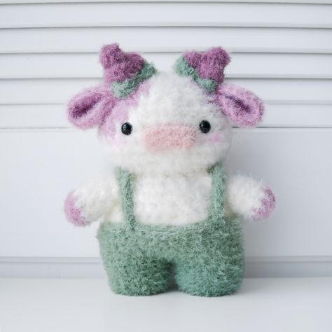 grape cow🍇🐮 yalllllll, im so sorry for the amount of cows that you are about to see from me😭 im obsessed with making them & this cow is one of my favorites that I’ve made so far, i love how it looks with the fuzzy yarn🥹 I also want to thank everyone for all the love in my fruit cows!!😭❤️✨ I’m so thrilled that y’all like them as much as I do, and it makes me so happy to see your creations of them🥹 they’re all soooooo adorable and it makes me so happy every time I see one! pattern: @crochet... Fruit Cows, I Want To Cuddle, Im So Sorry, Im Obsessed, Plushie Patterns, Brown Babies, Cow Pattern, So Sorry, Safety Eyes