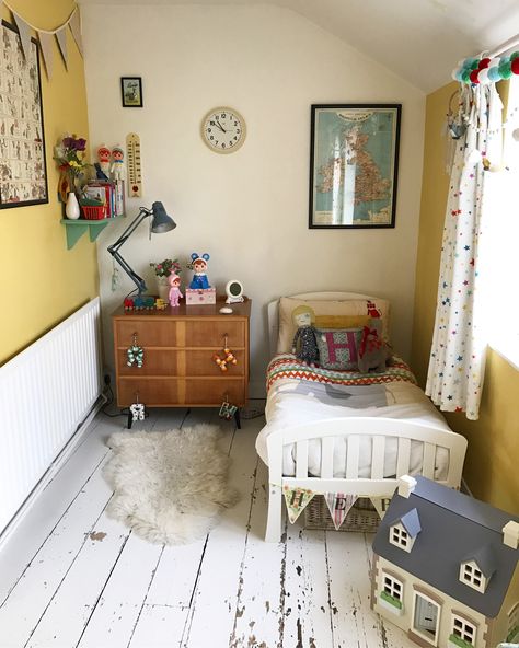 Vintage-style child's bedroom in Farrow and Ball's Citron #yellow #yellowbedroom #childsbedroom #girlsbedroom #farrowandball #citron #vintagestyle #retro #cottagelife #smallbedroom #smallspace Farrow And Ball Citron, Vintage Childs Bedroom, Child’s Bedroom, Kids Yellow Bedroom, Yellow Vintage Nursery, Yellow Kids Room, Vintage Kids Room Bedding, India Yellow Bedroom Farrow And Ball, Yellow Childs Bedroom