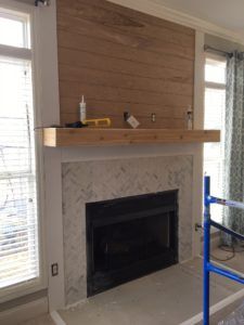 Our fireplace overhaul…from drab to fab! See the shiplap, herringbone tile and wood mantel transformation! Herringbone Tile Fireplace, Herringbone Fireplace, Fireplace Renovation, Wood Mantle Fireplace, Fireplace Redo, Shiplap Wood, Wood Mantel, Tile Fireplace, Brick Fireplace Makeover