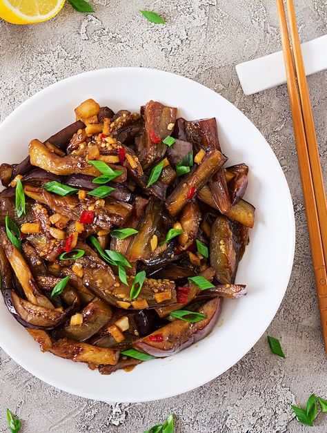 An easy Asian-style spicy eggplant dish, this uses prepared Korean BBQ sauce or Bulgogi sauce for major flavor impact. Serve on its own or over rice. Korean Eggplant Side Dish, Eggplant Gochujang, Vegan Asian Eggplant Recipes, Spicy Eggplant Recipe Thai, Unagi Eggplant, Bulgogi Sauce, Korean Bbq Sauce, Spicy Eggplant, Vegan Stir Fry