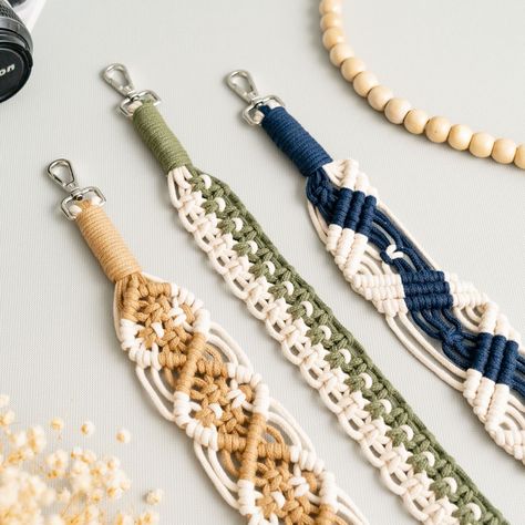 Looking for a stylish and practical accessory? Our handmade macrame strap is perfect for carrying your favorite purse or camera. Explore more at https://beandaikon.etsy.com/listing/1751615822 or get in touch with us directly! #camerastrap #macramecamerastrap #bohemianinspired #macramegifts #makrameart #bohogifts #handcraftedart #macramestyle #handmadegoods #macramehandmade #macramedecoration #lovemacrame #macrameartist #supportmakers #handmadelovers #macrameaccessory Macrame Camera Strap, Macrame Strap, Vintage Camera Strap, Yoga Kurse, Favorite Purse, Unique Gifts For Him, Macrame Decor, Handcrafted Art, Handmade Macrame