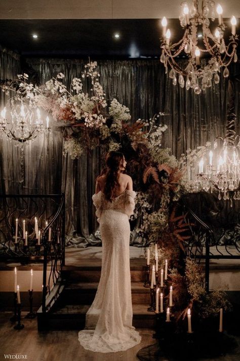 A dark and moody wedding ceremony planned by a wedding planner in Vancouver. This dark and mooding wedding decor included modern gothic wedding decor and dried florals from @flowerzvancouver1. Save this pin if you are planning a dark and moody wedding or modern gothic wedding. Photographer: @jumistory Moody Romantic Wedding Dress, Dark Wedding Florals, Gothic Winter Wedding, Dark And Moody Wedding Decor, Dark Romantic Wedding Dress, Dark Academia Wedding Dress, Dark Moody Romantic Wedding, Dark Modern Wedding, Gothic Wedding Ceremony