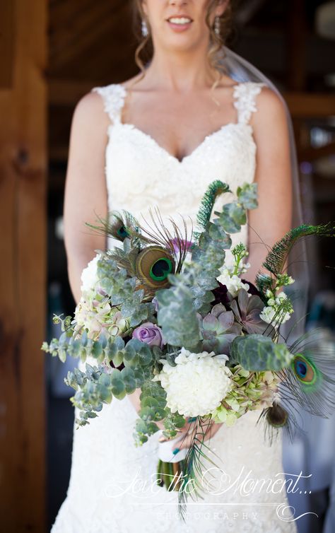 Peacock theme wedding bouquet Boho Peacock Wedding, Peacock Bridal Bouquet, Peacock Feather Wedding Bouquet, Peacock Green Wedding, Bouquet With Peacock Feathers, Peacock Feather Bouquet, Peacock Wedding Flowers, Peacock Wedding Bouquet, Peacock Theme Wedding