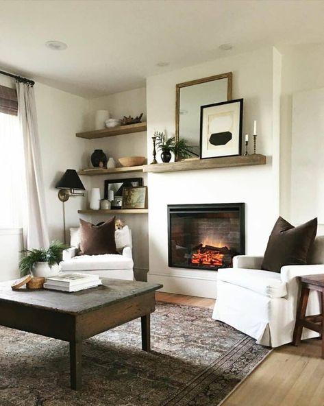 Brown Accent Pillows, Fireplace In The Middle, White Painted Fireplace, Textured Area Rug, Painted Fireplace, House Upgrades, White Armchair, Wood Mantel, Behind Couch