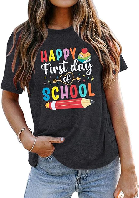 FEATURES: This trendy and comfortable T-shirt is perfect for the back-to-school season. First day of school t shirt for women, unique teacher graphic tee tops, 1st day of school shirt, back to school teacher tshirt, making it the perfect gift for any educator in your life. DESIGN: The front of the T-shirt features a vibrant print consisting of colorful letter patterns. You'll find the joyful message "Happy First Day of School" in bold letters. Adding to the school theme School Teacher Shirts, Black Shirts Women, Black Floral Top, 1st Day Of School, Crop Top Dress, 1st Day, Crewneck Dress, Long Sleeve Short Dress, Black Shirt Dress