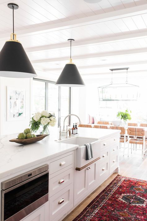 Beautiful white kitchen with black light fixtures over island and vintage rug Mcgee Kitchen, Studio Mcgee Kitchen, Marble Counters, Bridge Faucet, House Farm, Farmhouse Kitchen Design, Classic Kitchen, White Kitchen Design, Farmhouse Sink Kitchen