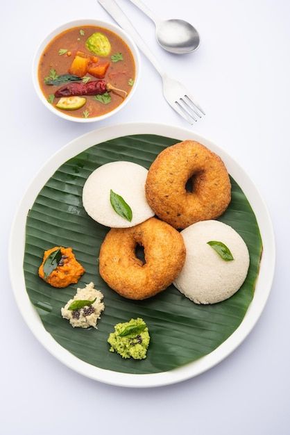 Photo idli vada with sambar pr sambhar a... | Premium Photo #Freepik #photo #dosa #idly #masala-dosa #vada Idli Vada Sambar, Medu Wada, Idli Vada, Idli Sambhar, Medu Vada, Idli Sambar, Masala Dosa, Airplane Window, Rice Cakes