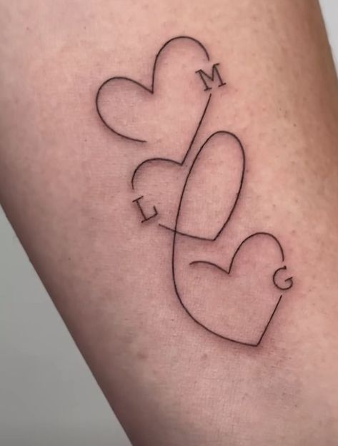 Womens Tattoo For Son, Heart D Tattoo, Mother Tattoo Symbol, 3 Heart Tattoo With Initials, Heart With Initial Tattoo Letters, Tattoos Ideas For Moms, Minimalist Tattoo Daughter, Heart Tattoo On Wrist Ideas, Tatoos For Mother And Dauther