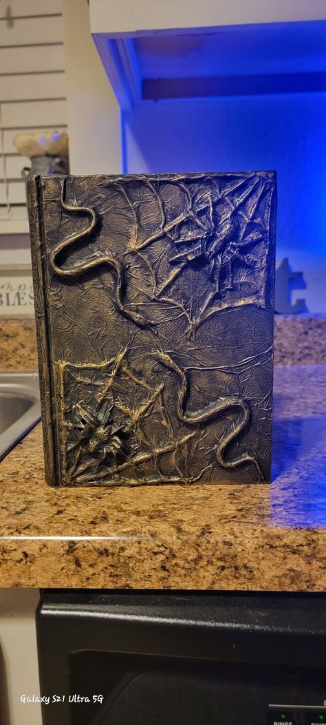 Homemade spell book Hot Glue Halloween Crafts, Hot Glue Craft Ideas, Goth Glue Art, Hot Glue Spider Web Diy, Glue Spider Web Craft, Salt Paint Spider Web, Goth Glue, How To Make Spiders, Hot Glue Art