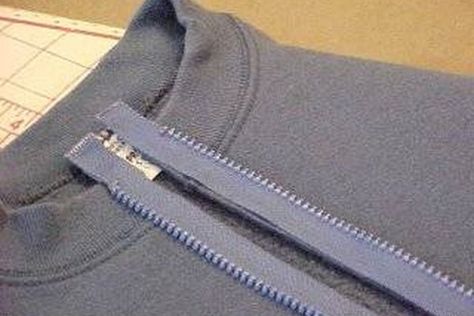 Hoodies, or hooded sweatshirts, are sometimes preferred over those that zip up the front, but occasionally when a hoodie seems too heavy for the season, putting a zipper on the front of it is just the solution needed. Adding a zipper to a garment is an easy sewing procedure; putting a zipper on a sweatshirt is no exception. If you're having trouble... Sweatshirt Makeover, Sweatshirt Refashion, Jackson Ms, Diy Sweatshirt, Beginner Sewing Projects Easy, Sweatshirt Zipper, Christmas Sewing, Sewing Projects For Beginners, Sewing Skills