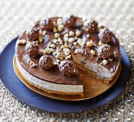 Chocolate Hazelnut Cheesecake, Ferrero Rocher Cheesecake, Hazelnut Cheesecake, Goals Board, Nutella Cheesecake, Bbc Good Food, Chocolate Hazelnut Spread, Digestive Biscuits, Berries Recipes