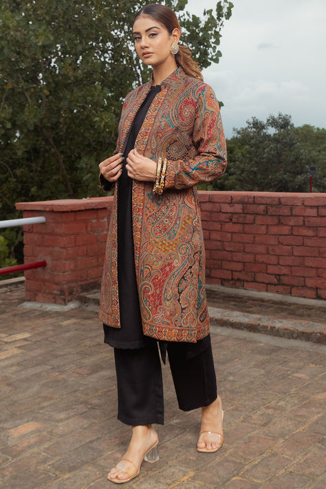 Featuring a multi-colored jacket in an acrylic viscose blend base with kani weave and paisley print. It is paired with a matching pashmina kurta and pants. Style it with statement earrings and heels for festive occasions. Last Few Days END OF SEASON SALE up to 80% off. #Perniaspopupshop #womenswear #ethnic #whatiworewastrending #ppuslove #jacketset #viscoseblend #acrylic #weddingwear #sangeet #festivewear Fall Chikankari Embroidery Kurta, Long Outerwear With Chikankari Embroidery, Festive Long Outerwear With Chikankari Embroidery, Elegant Long Kurta For Fall, Designer Chikankari Embroidered Kurta For Fall, Festive Transitional Long Sleeve Outerwear, Festive Kurta With Stand Collar For Fall, Festive Fall Kurta With Stand Collar, Elegant Embroidered Multicolor Outerwear