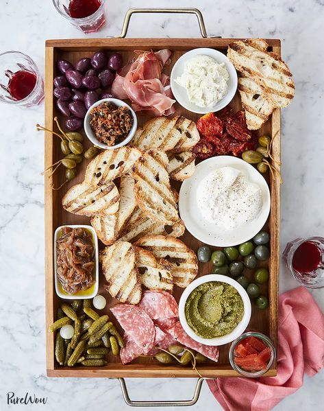 Italian Bruschetta Bar Recipe - PureWow Easy Dinner Party Recipes, Fingerfood Baby, Italian Bruschetta, Bruschetta Bar, Best Party Appetizers, New Year's Eve Appetizers, Fancy Appetizers, Best Appetizer Recipes, Dinner Party Recipes