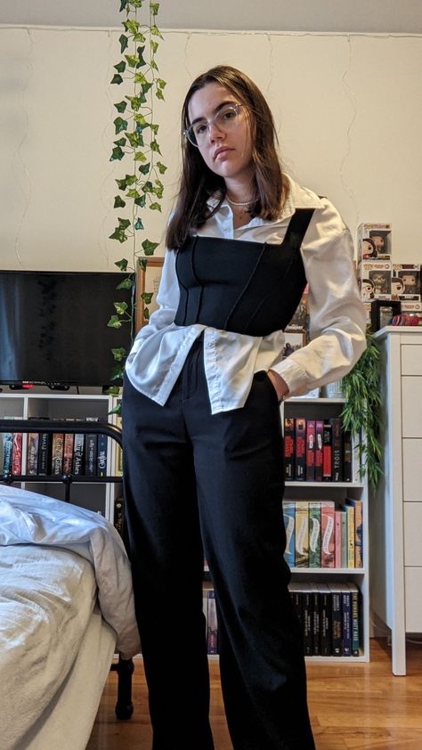 Corset Formal Outfit With Pants, Corset Top Over Button Up, White Button Up With Corset Outfit, Black Corset On White Shirt, Black Top Layered Outfit, Corset With Undershirt Outfit, Button Up Shirt With Corset Outfit, White Button Up And Black Pants, Black Corset White Shirt Outfit