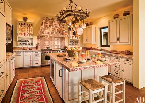 Tour Ted Turner's Hacienda-Style Home in New Mexico Spanish Kitchen Decor, Spanish Kitchen Design, Spanish Style Bathrooms, Spanish Style Kitchen, Historic Kitchen, Boho Glam Home, Rustic Kitchen Lighting, Spanish Kitchen, Ranch Kitchen