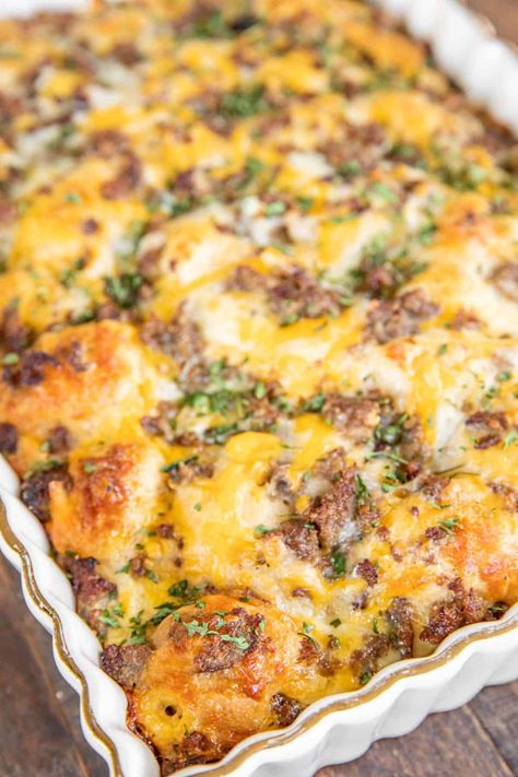 Bubble Up Biscuit Breakfast Casserole - sausage, eggs, milk, cheese, and biscuits. SO good! Great for baby showers, overnight guests, and holiday mornings. This only takes minutes to make and is ready to eat in about 35 minutes. We LOVE this quick and easy casserole for breakfast, lunch, and dinner! #sausage #biscuit #breakfast #casserole Bubble Up Breakfast, Biscuit Breakfast Casserole, Breakfast Casserole With Bacon, Plain Chicken Recipe, Biscuit Breakfast, Casserole With Bacon, Breakfast Casserole With Biscuits, Dinner Sausage, Breakfast Inspiration