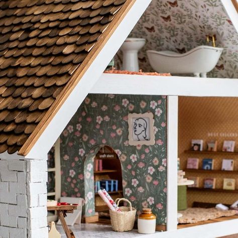 Geneva Vanderzeil on Instagram: "THIS YEAR’S DOLL HOUSE - THE BIG REVEAL AND A HOUSE TOUR! The theme this year was plant shop, cafe, craft room and book store - and I have to say I’m really happy with it! Honestly it’s been such a rollercoaster, but that was to be expected when I decided to do it with a Christmas deadline, and the highest possible standards. The part that makes me most happy about this is that I found that it was possible to transform a secondhand A frame dollhouse into something really unique and interesting. So you don’t need a family heirloom to get started! And it didn’t really cost that much to do it, because all the materials are simple craft supplies. IF you ignore how much money I spent on tiny pastries and a mini pour over coffee stand (which isn’t that essential Tiny Pastries, Pour Over Coffee Stand, House Makeovers, Coffee Stand, Coffee Stands, Big Reveal, Plant Shop, Dollhouse Toys, Simple Craft