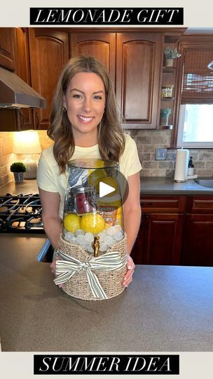 613K views · 33K reactions | Cute gift idea for Mother’s Day and this spring/summer 🍋 Comment “LEMON” to be sent all the items I used here 🩷

I adore this drink dispenser and wanted to fill it with all things lemonade theme 🤗 I added reusable ice cubes, lemons, lemonade mix, a dish towel, raspberries, blueberries, and a lemon squeezer 🥰 

#giftideas #mothersday #mothersdaygiftideas | Tara Panasiuk | the_magnolia_mercantile · Original audio Lemonade Gift Basket Ideas, Lemonade Basket Ideas, Beverage Dispenser Gift Ideas, Drink Dispenser Gift Ideas, Beverage Dispenser Ideas, Lemonade Gift Basket, Summer Gift Baskets, Reusable Ice Cubes, Gift Idea For Mother