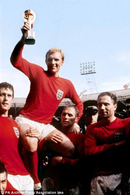 Bobby Moore holding the Jules Rimmet World Cup trophy in 1966. Winning the trophy in England no less. Press Association 1966 World Cup Final, Bayer Munich, England National Football Team, Liverpool Champions, Bobby Moore, 1966 World Cup, Bobby Charlton, World Cup Trophy, England Football Team