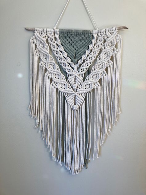 Macrame wall hanging, made with green sage & beige cord. Made by megs macrame designs Macrame With Two Colors, Two Tone Macrame Wall Hanging, Plant Hanger Wall, Macrame Designs, Paracord Projects Diy, Pola Macrame, Macrame Wall Hanging Tutorial, Macrame Wall Hanger, Macrame Wall Hangings