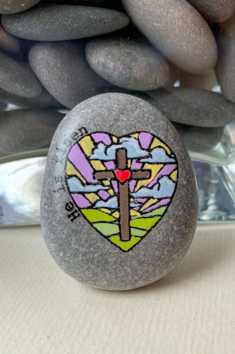 hand-painted stone is the perfect Easter gift for adults and children alike. Featuring the inspiring phrase "He is risen," this rock serves as a wonderful reminder of the resurrection of Jesus Christ and the hope that it brings to all believers. Jesus Crafts For Adults, Resurrection Painting, Valentines Rocks, Resurrection Crafts, Easter Gifts For Adults, Easter Rocks, Easter Gift For Adults, Easter Sunday School, Jesus Crafts