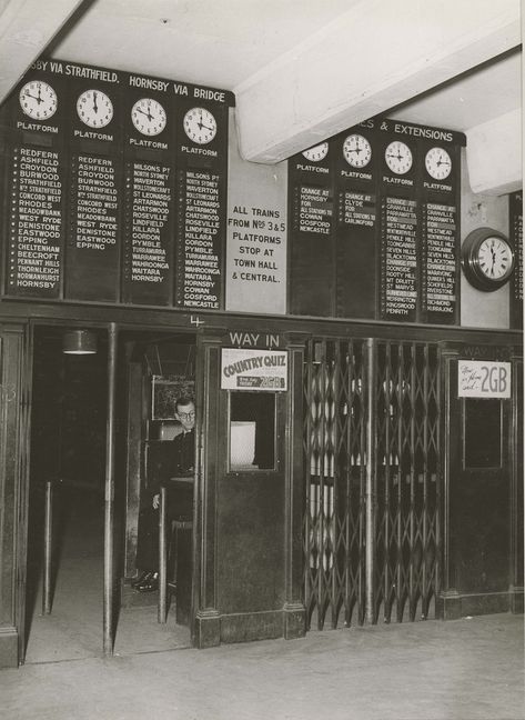 Departures indicator boards and clocks, above entry barriers at Wynyard Railway Station Dated: 27 August 1948  www.records.nsw.gov.au  v@e Train Station Art, Departures Board, Australia History, Sydney City, Bus Station, Sydney Harbour Bridge, Railway Station, Black And White Photographs, New South Wales