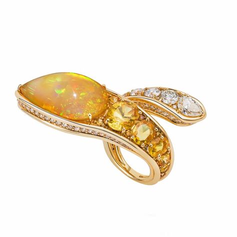 Quickly establishing themselves as one of the world’s most sought-after gemstones, prepare to be seduced by the magnificence of Ethiopian Wello opals. Ethiopian Opal Jewelry, Peruvian Blue Opal, Ethiopian Opal Ring, Snake Jewelry, Luxury Jewellery, White Gold Set, Emerald Pendant, Classy Jewelry, Brown Diamond